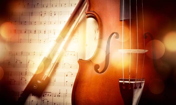 Music. Close-up Photo Of Violin And Musical Notes symphony orchestra photos stock pictures, royalty-free photos & images