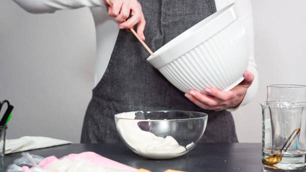 istock Mixing in food coloring into the royal icing 1160047867