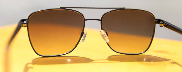 istock summer yellow sunnglasses background panorama 1160049376