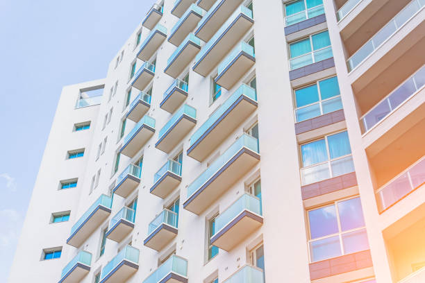 istock Multi-storey apartment property with windows and balconies. 1160053093