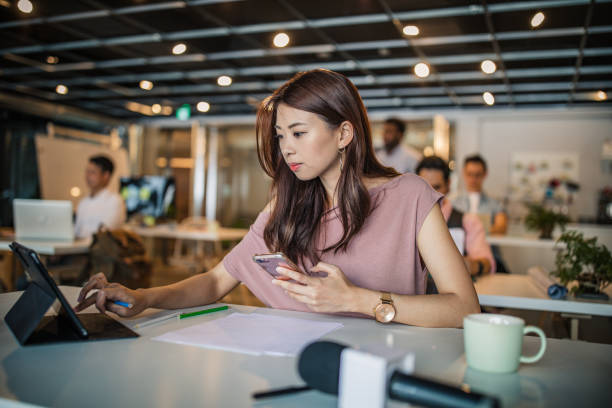 istock Woman in modern office 1160054459