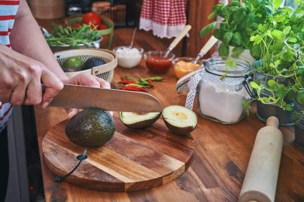 istock Preparing Vegetarian Avocado Pizza with Cottage Cheese and Chili 1160056614