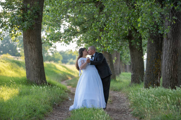 istock Newly wed couple in forest 1160056823