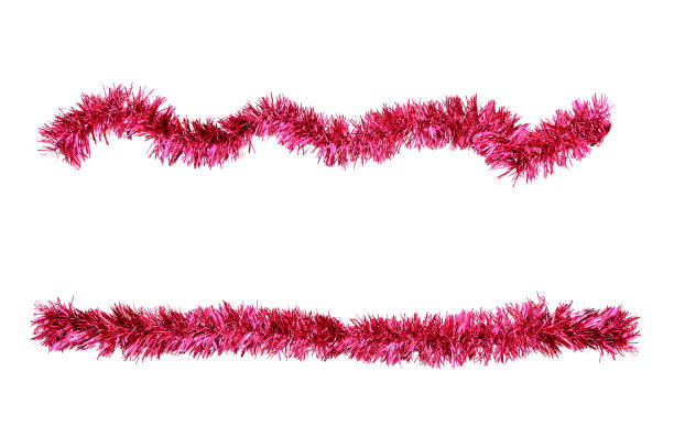 Christmas red tinsel for decoration. White isolate Christmas red tinsel for decoration. White isolate tinsel stock pictures, royalty-free photos & images