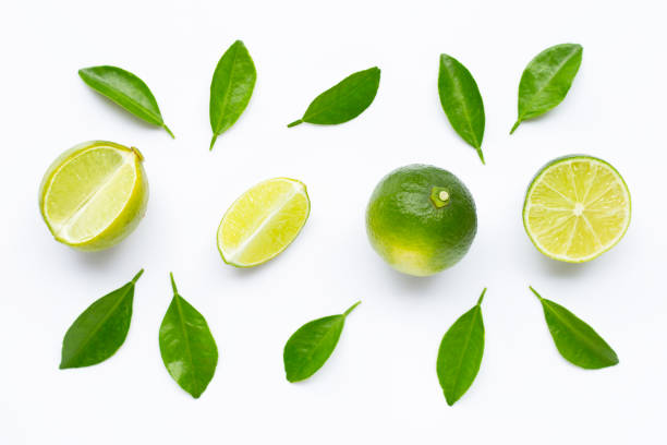 istock Limes with leaves isolated on white background. 1160060561