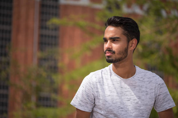 istock Male model posing in front of old industrial river 1160060563