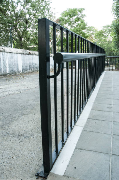 istock Protection railing for access ramp to a building in black color 1160060910