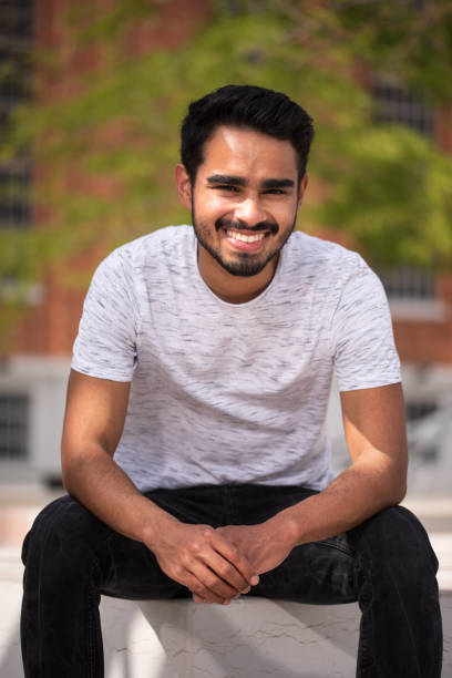 istock Male model posing in front of old industrial river 1160061655