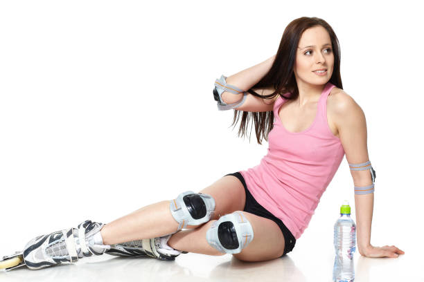 istock The beautiful young woman in rollerskates. 1160061920