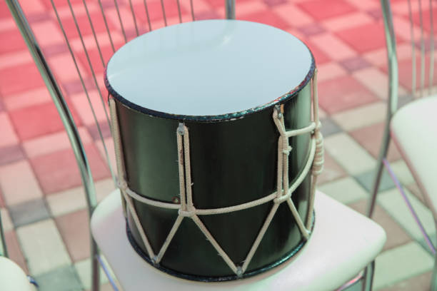 istock Black Drum on the chair . Azeri traditional drum nagara on black . 1160065185