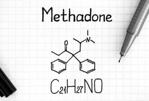 istock Chemical formula of Methadone with black pen. 1160065324