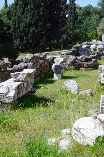 istock Ancient Greek ruins, ruins amidst lush green grass. Acropolis, Athens, Greece. 1160065733