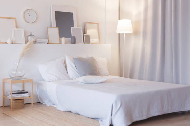 istock modern bedroom with floor lamp and decorations 1160066578