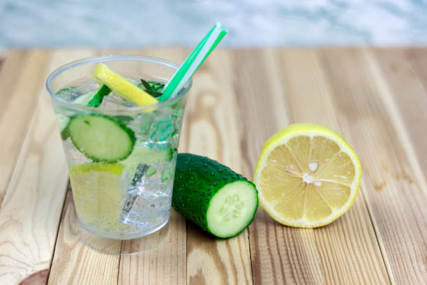 istock refreshing drink with ingredients, cucumber water on a wooden table 1160066894
