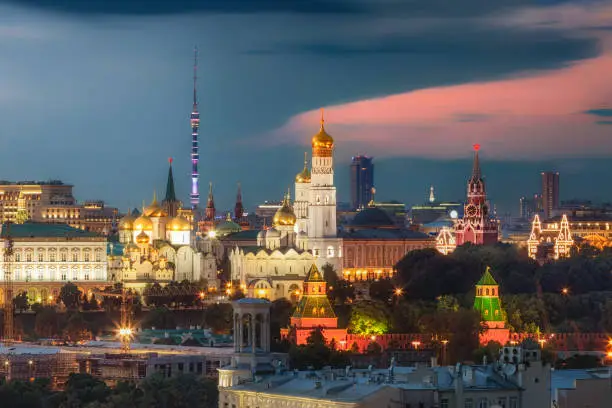 Photo of Illuminated landmarks of the Moscow Kremlin and Ostankino tower in dusk