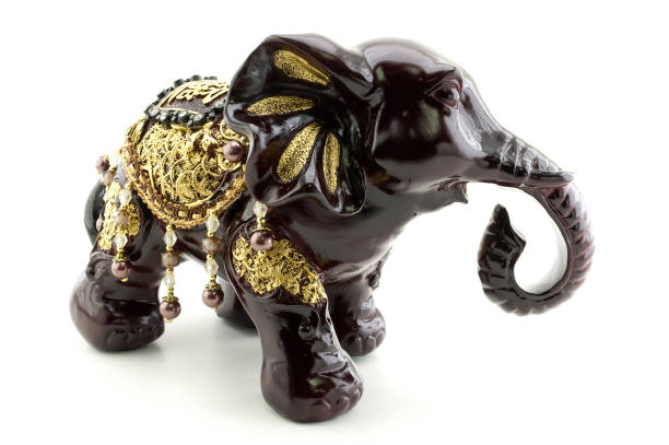 istock Bronze statuette of elephant isolated on white background 1160074010