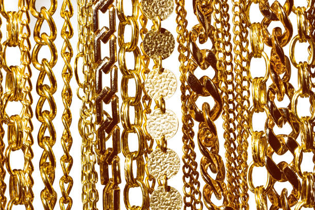 istock gold shiny chains on white background isolated 1160076422