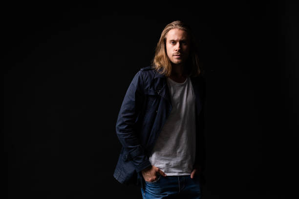 istock handsome young and fit man posing in casual clothes, wearing jacket. 1160078026