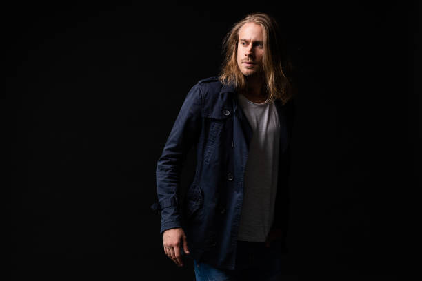 istock handsome young and fit man posing in casual clothes, wearing jacket. 1160078057