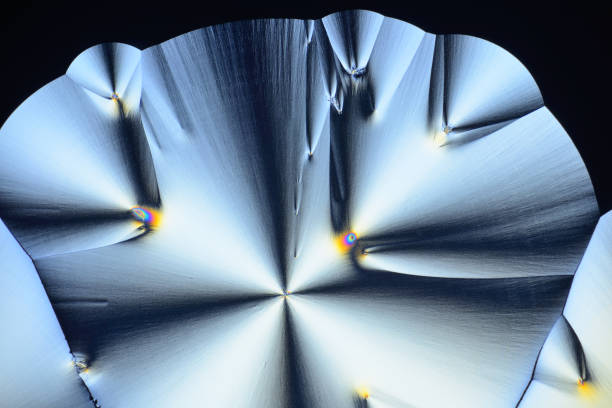 istock Colorful micro crystals in polarized light. Photo through a microscope. 1160078133