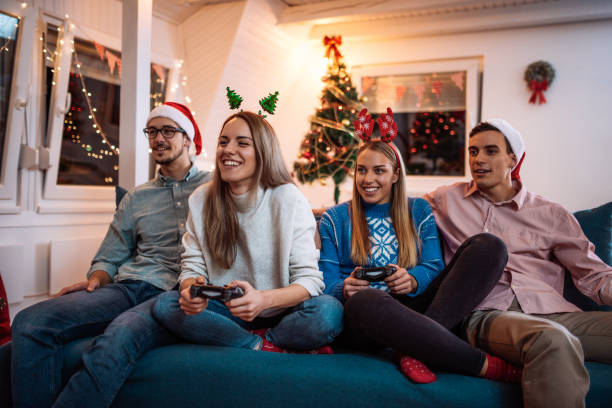 istock Generation Z celebrate Christmas and playing video games 1160080344