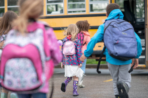 istock Walking to the school bus 1160082339