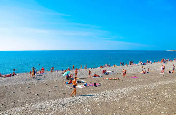 Beach in Imereti Bay, Adler. Pebble beach on the Black Sea, Sochi