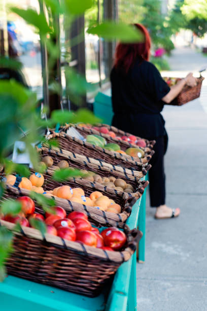 istock Woman opening small zero waste oriented fruit and grocery store. 1160091469