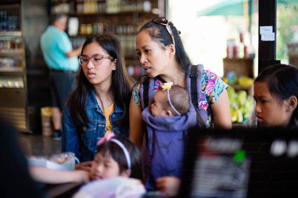 istock Customers shopping in small zero waste oriented fruit and grocery store. 1160092728