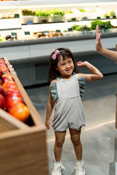 istock Customers shopping in small zero waste oriented fruit and grocery store. 1160093800