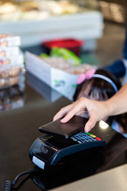 istock Close-up on contactless payment with mobile phone. 1160095125