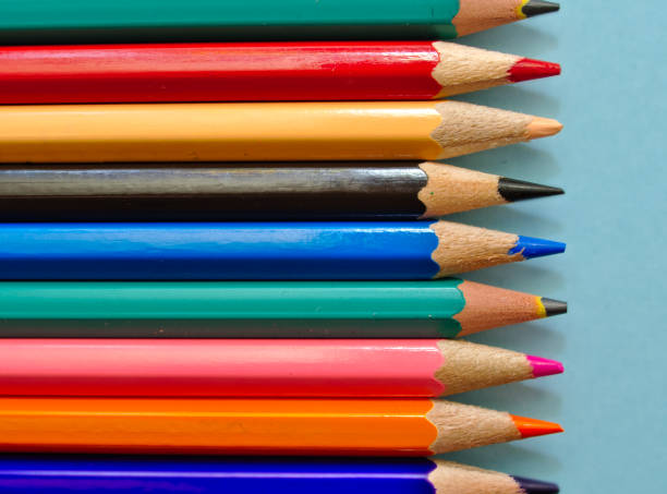 istock Color pencils isolated on light blue background with copy space. 1160104703