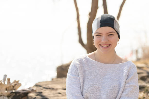 istock Beautiful young woman with cancer 1160108798