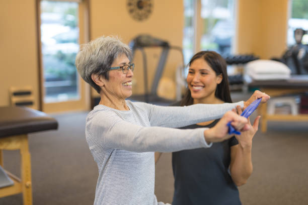 istock A senior woman works with her occupational therapist 1160110921