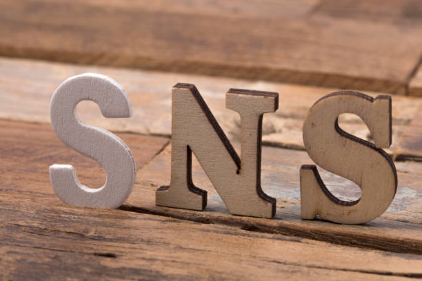 istock SNS wood letters on wooden board 1160115849
