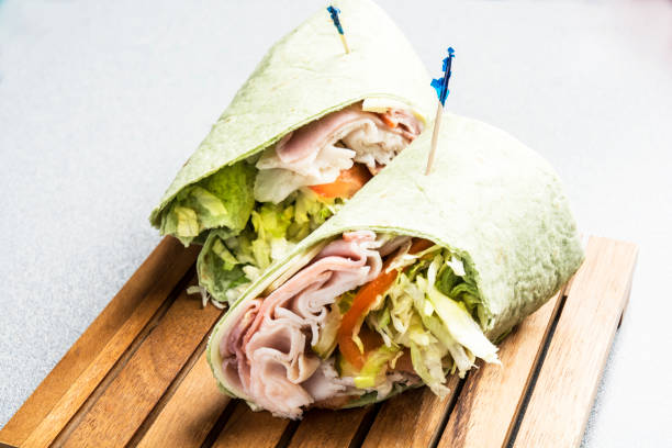 turkey club wrap sandwich - sandwich club sandwich ham turkey imagens e fotografias de stock