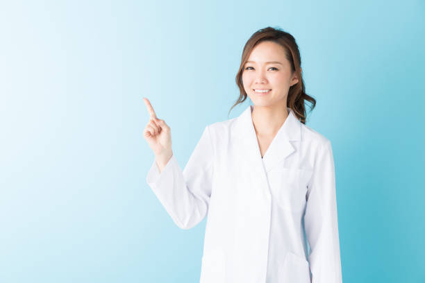 istock woman in a white coat 1160121868