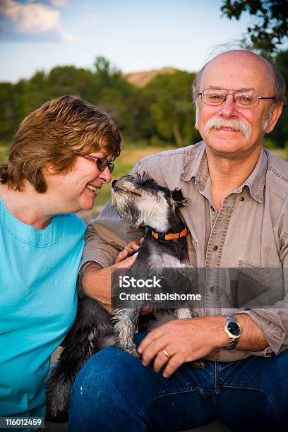 Amore Di Cucciolo - Fotografie stock e altre immagini di Cane - Cane, Uomini maturi, Adulto