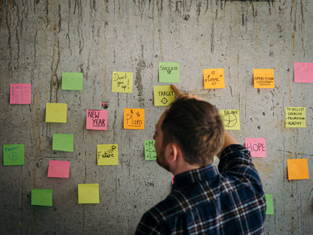 Man Putting Sticker 70+ Hand Putting Sticker Stock Photos, Pictures & Royalty-Free Images ...