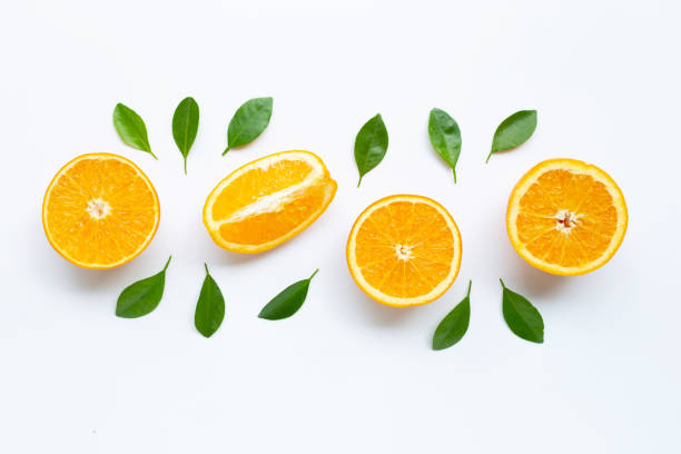 istock High vitamin C. Fresh orange citrus fruit with leaves isolated on white background. 1160124976