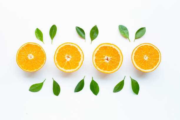 istock High vitamin C. Fresh orange citrus fruit with leaves isolated on white background. 1160125809