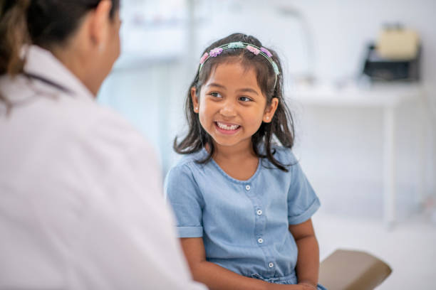 istock Cute little girl at doctor's office 1160127854
