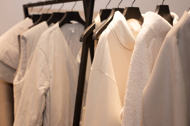 istock Fashion Design Clothes on Display rack in retail 1160128660