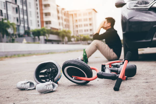 istock Man are stressed while being drunk with driving crash a child bike accident occurs. 1160129590