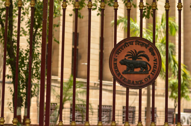 Delhi India 2019 Rbi Logo On The Closed Iron Gate Of Reserve Bank Of India  Building At Patel Chowk Parliament Road Connaught Place With The Office  Building In The Background Stock Photo -