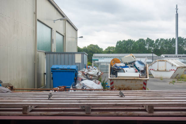 istock in a backyard there are garbage containers and a container with scrap metal 1160134462
