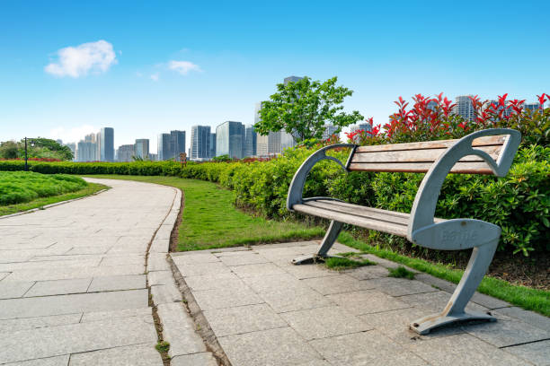 istock Street parks and modern buildings 1160140461