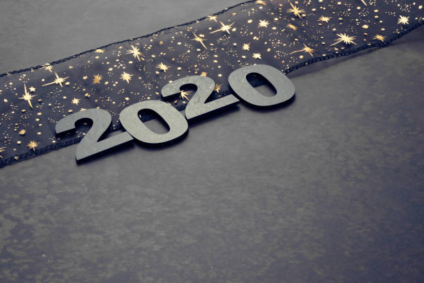 istock Happy New Year 2020. Symbol from number 2020 on stone background 1160143815