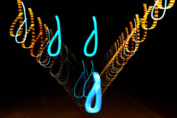 istock Light painting of a pattern of colorful blurred lights 1160145650