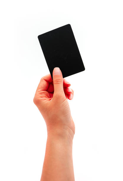 istock Female hand showing a black card, isolated on white background. 1160147492